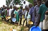 Children queue for food in Zimbabwe